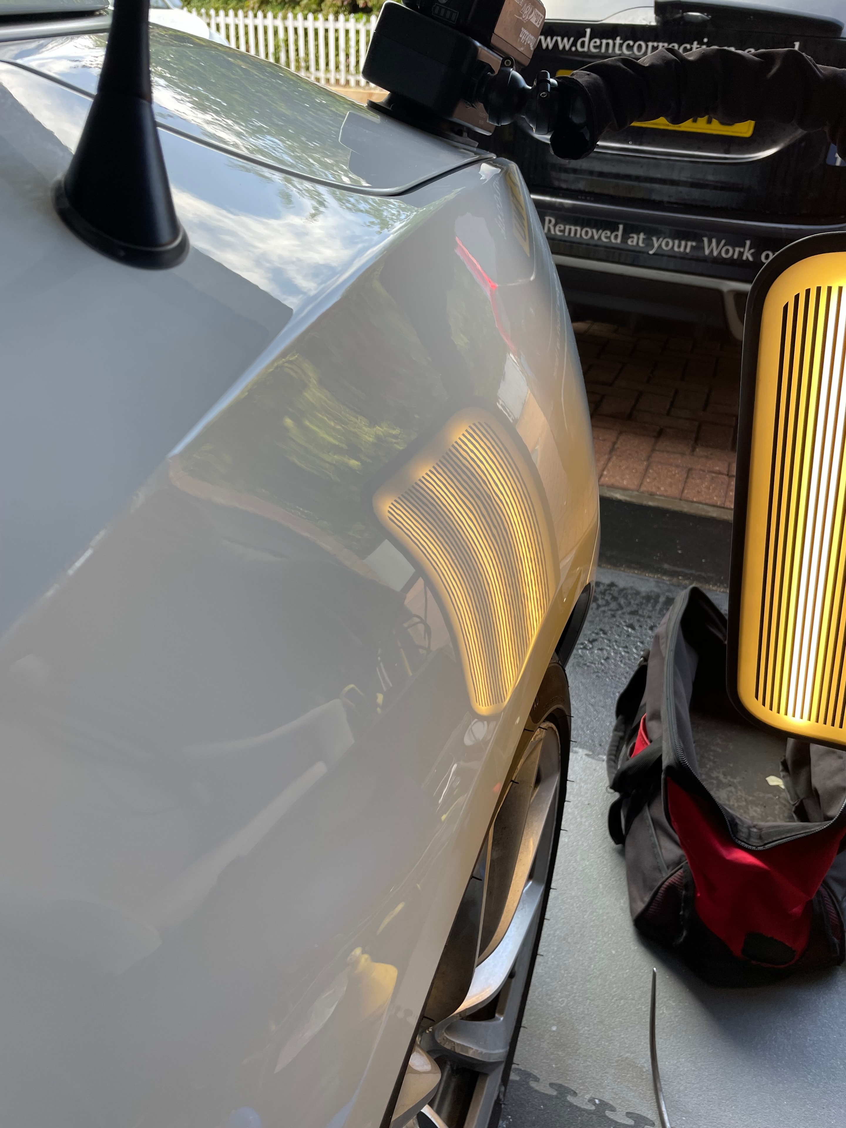 PDR repair work in progress on car panel